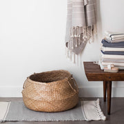Cotton bath rug with woven basket