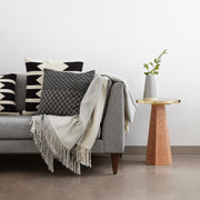 Baby Alpaca Throw Pillow on Modern Couch
