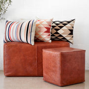 Modern Throw Pillows on Leather Bench from The Citizenry