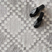 Overhead of Diamond Pattern Runner with Black Shoes