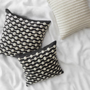 Textured Pillows Tossed on Bed