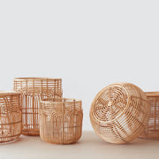rattan ottomans and baskets