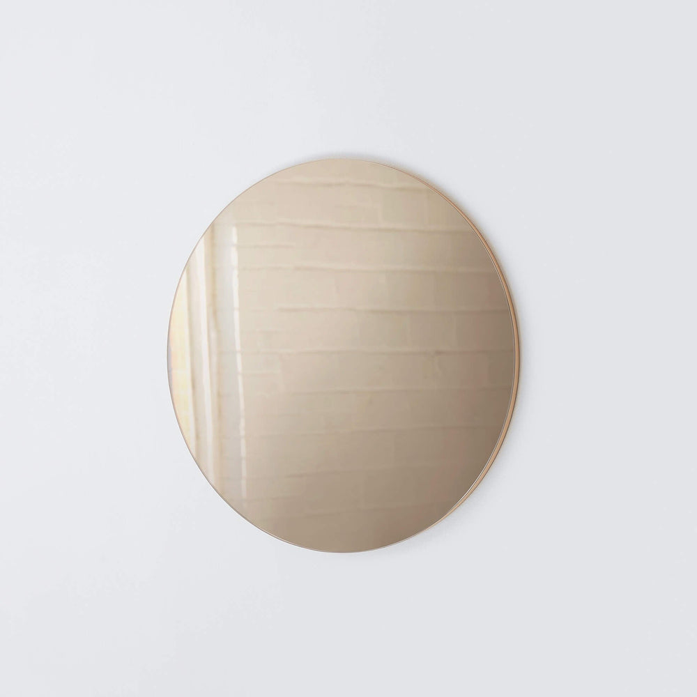 Small circular mirror