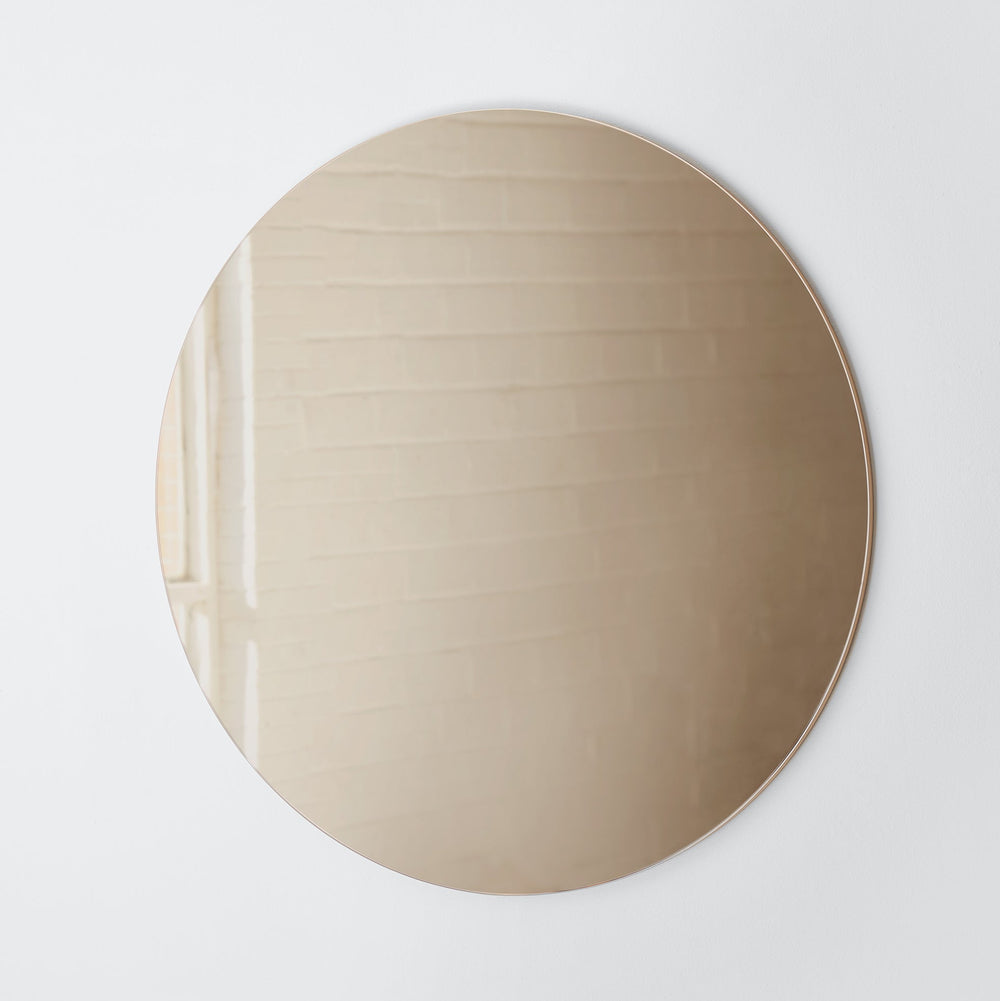 Gunmetal-bronze large circular mirror