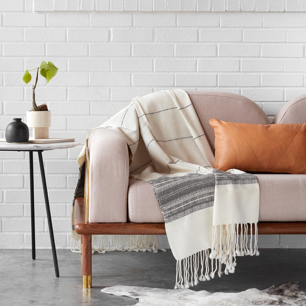 Black and White Throw Draped Over Couch