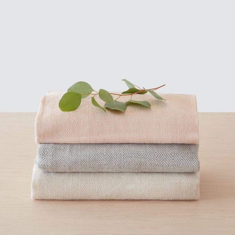 Stack of Diamanta Alpaca Throw Blankets, dove-grey
