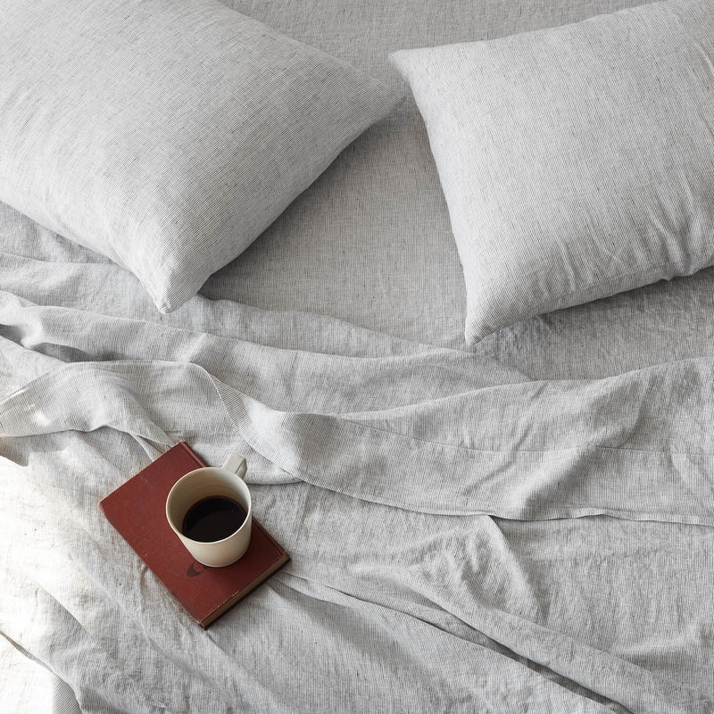 Overhead of Linen Pillows and Sheet Set in Stripe Pattern, graphite-stripe