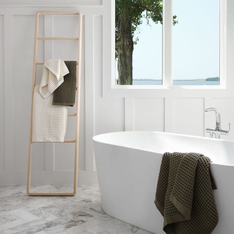 Waffle towels on Hinoki wood ladder in bathroom, natural
