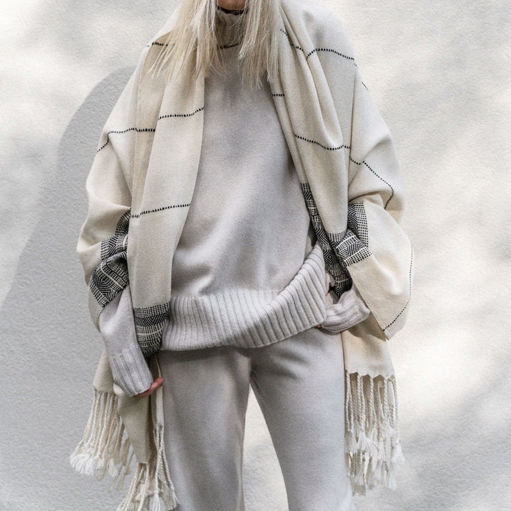 Model draped in alpaca throw