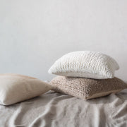 Alpaca and wool pillow stacked