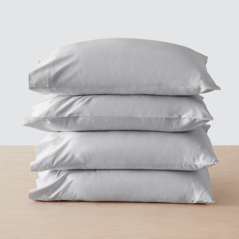 Stack of four pillows, solid-light-grey