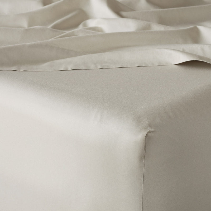 Corner of fitted sheet, solid-sand
