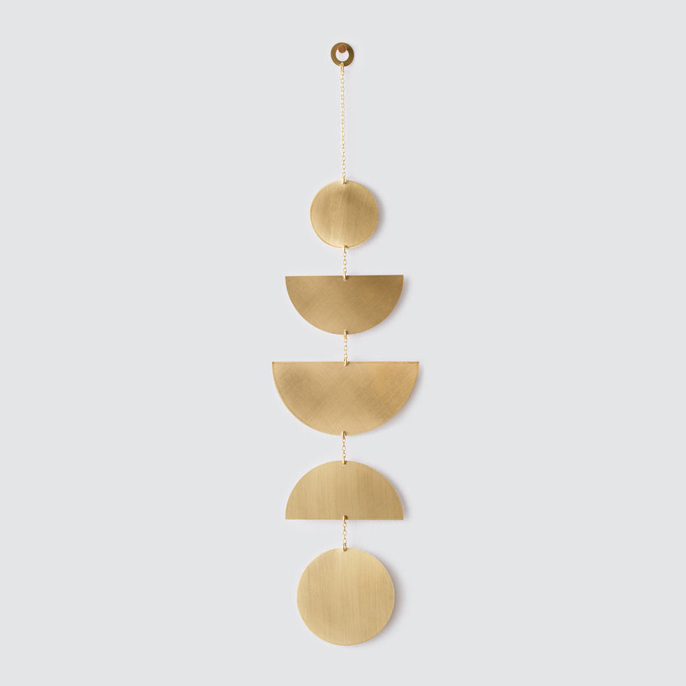 Brass geometric wall hanging