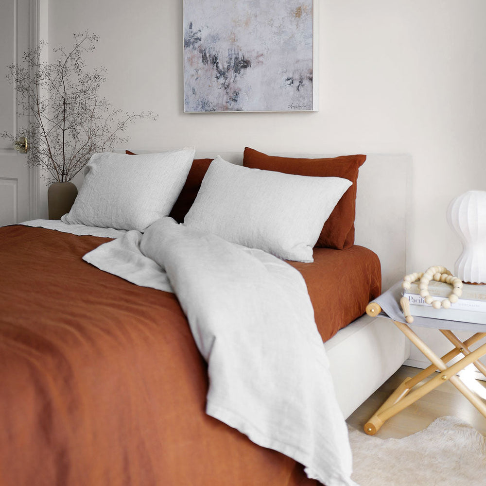 Styled bedroom with sienna and grey stripe bed set