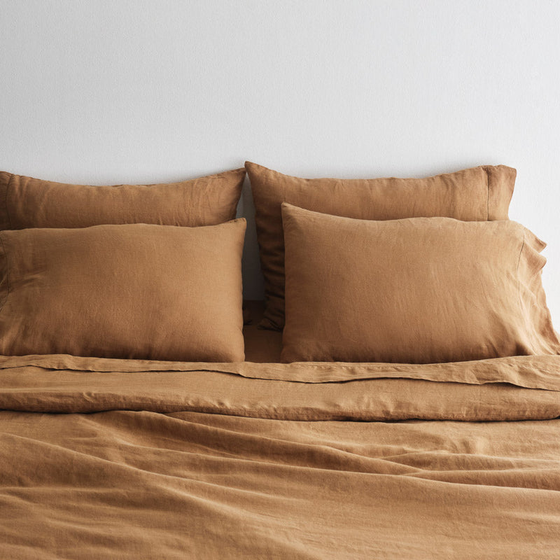 Linen sheet set and pillows, camel
