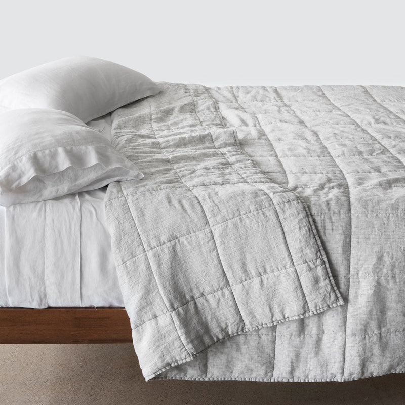 Side of bed with graphite stripe stonewashed linen quilt, graphite-stripe