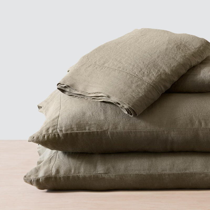 Folded Stack of Olive Linen Bedding, olive