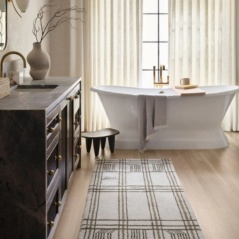 Tiya olive runner in front of freestanding tub, olive