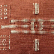 Detail of pillow, rust