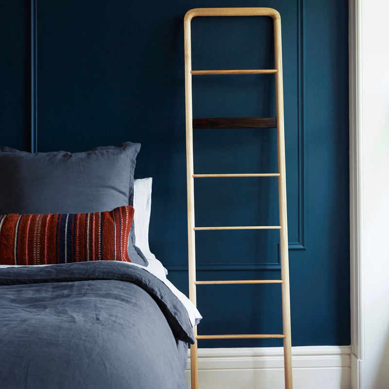 Stonewashed Linen Euro Shams on styled bed, slate-blue