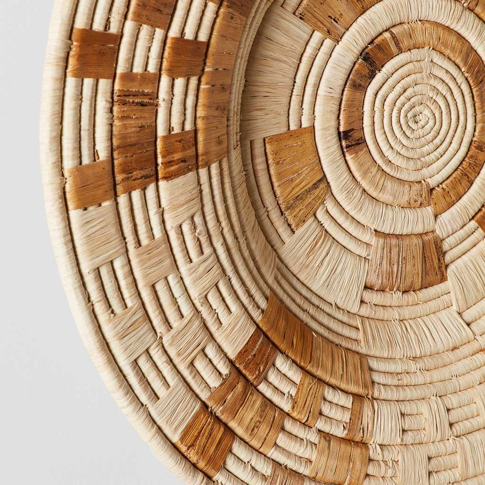Detailed view of weaving on Zomba wall hanging