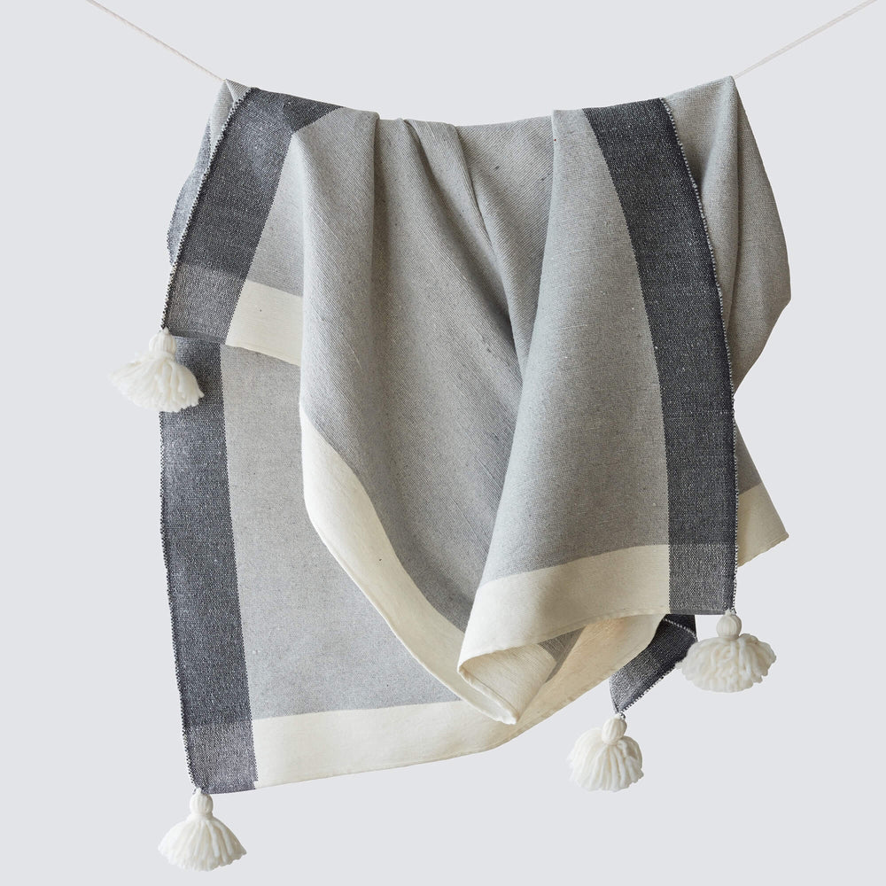 Modern throw with tassels